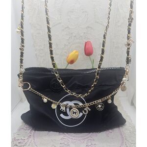 Chanel Black Puffy Bag with Crossbody and Accent Front Chain New